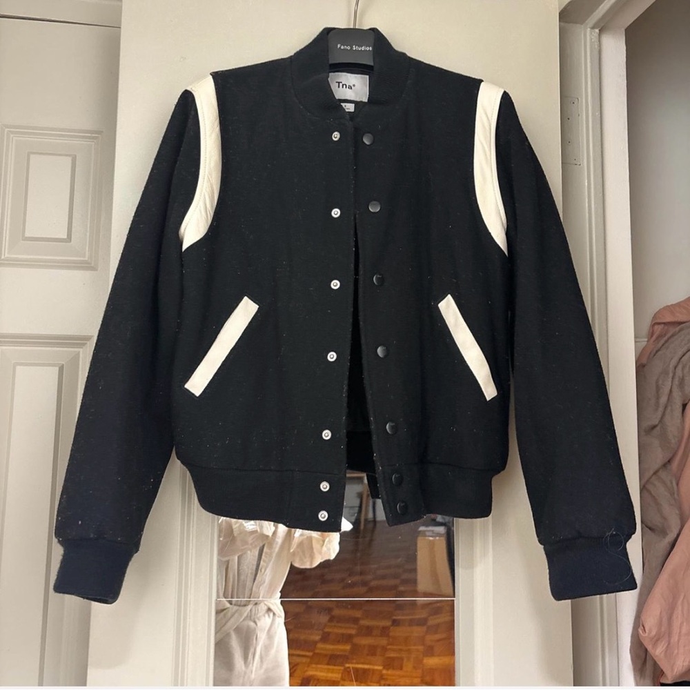 TNA Black Jacket with White Label